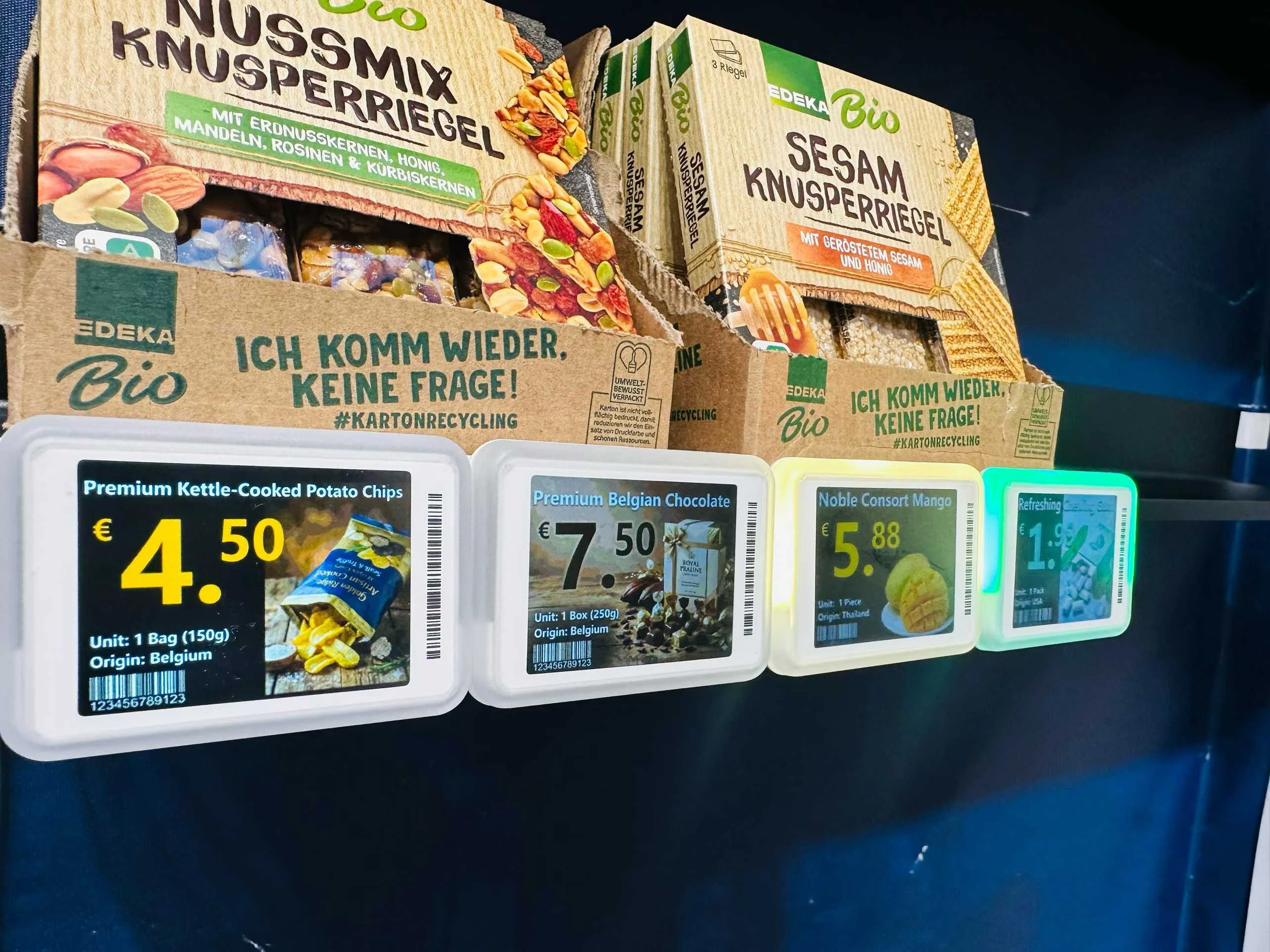 Full colour shelf displays presenting product images and pricing